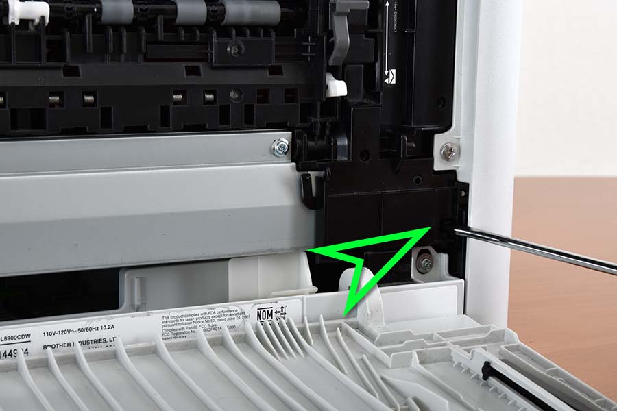 Remove right fuser cover release tab