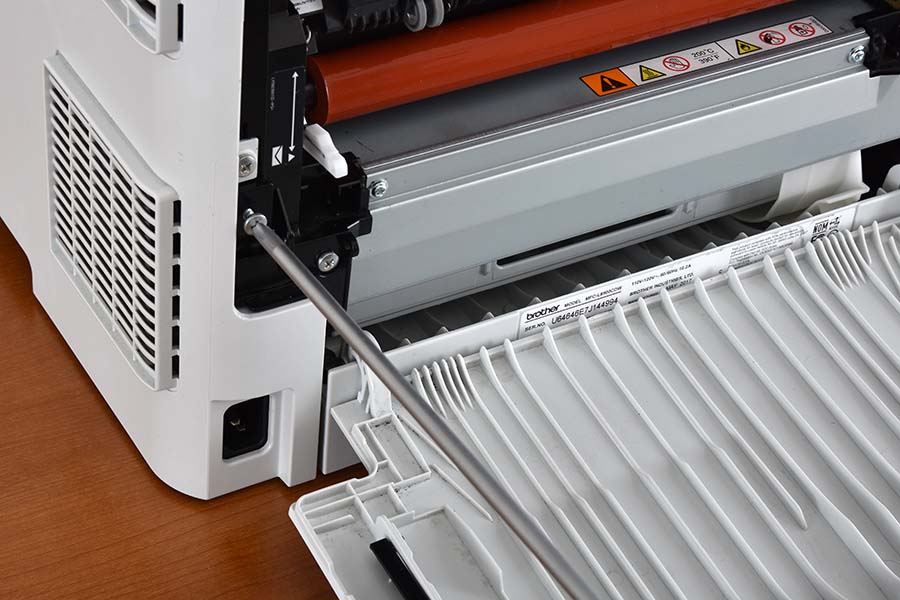 Remove left fuser cover upper screw