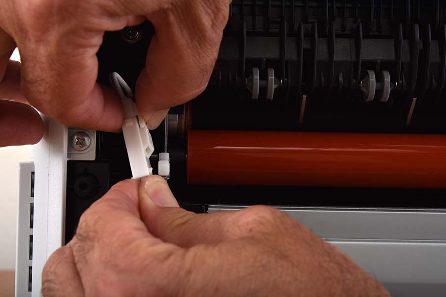 Disconnect left fuser wiring