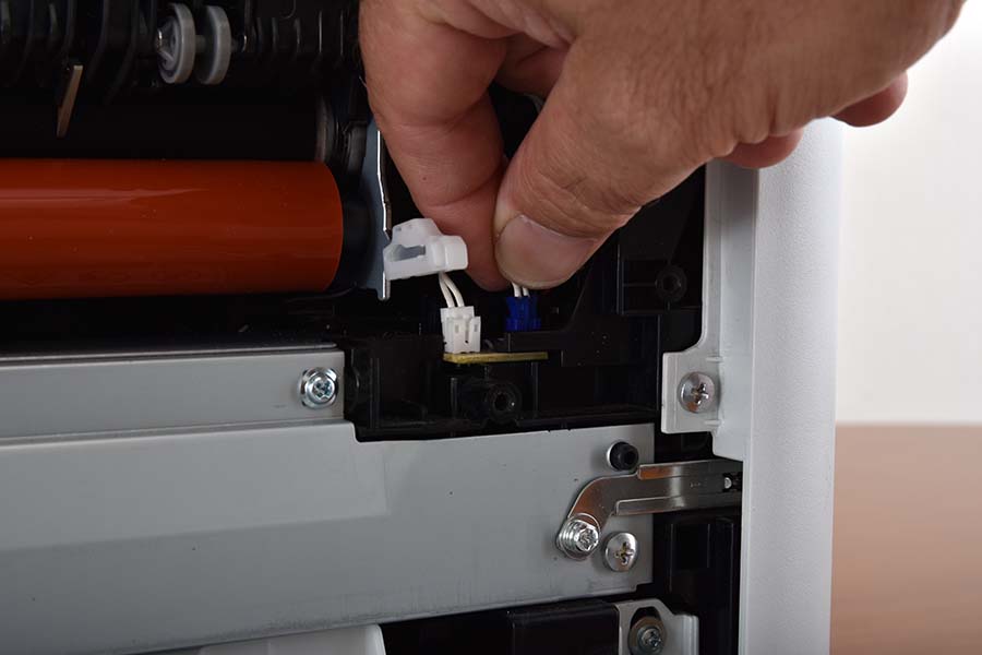 Disconnect right fuser wiring