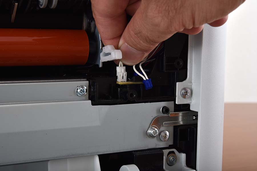 Disconnect right fuser wiring