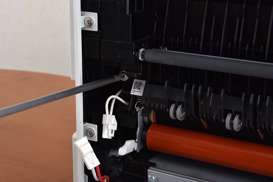 Remove fuser assembly left screw