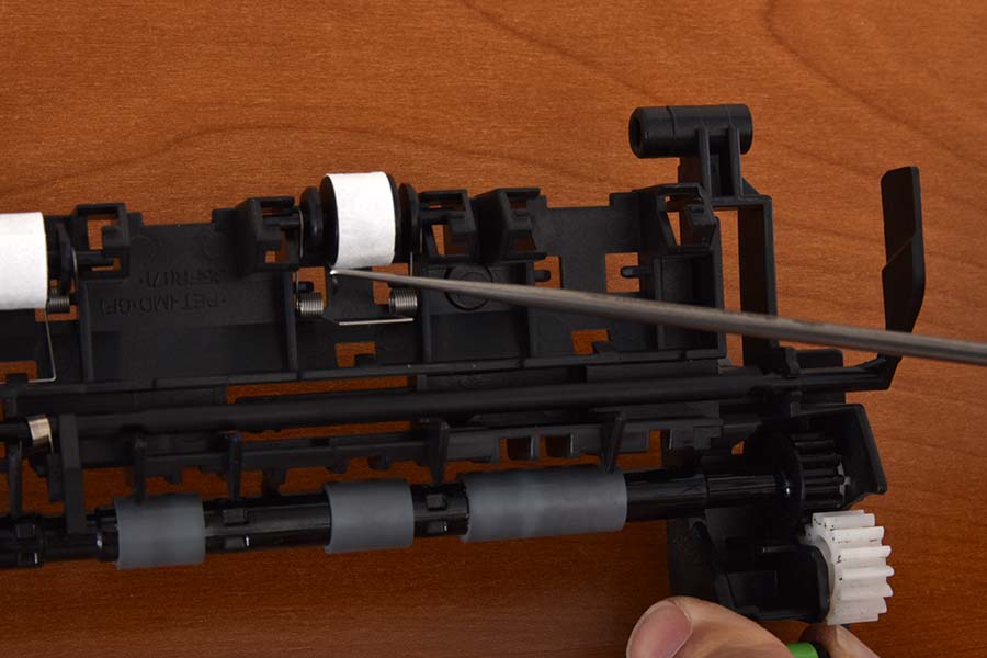 Install pinch roller into assembly