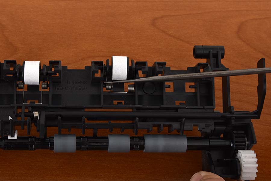 Slide spring over left post