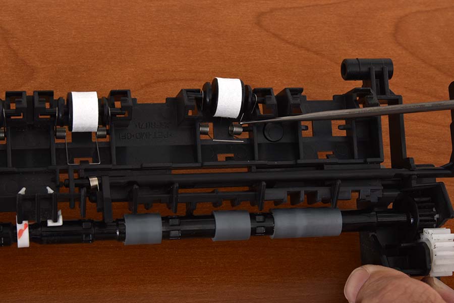 Slide spring over right post