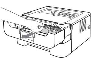 Removing Brother TN-420 drum unit and cartridge assembly.