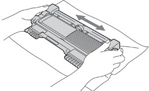 Gently shaking toner cartridge for Brother HL-2220, HL-2230, HL-2240, HL-2270, HL-2280