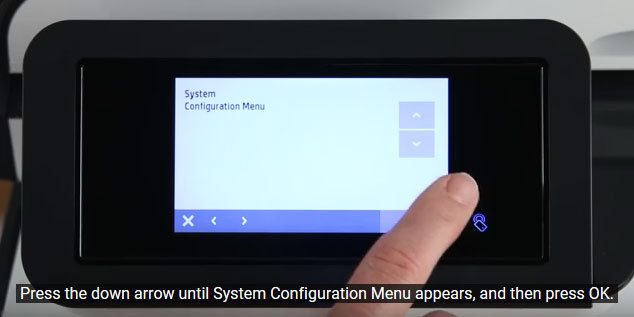 Press the down area until System Configuration appears