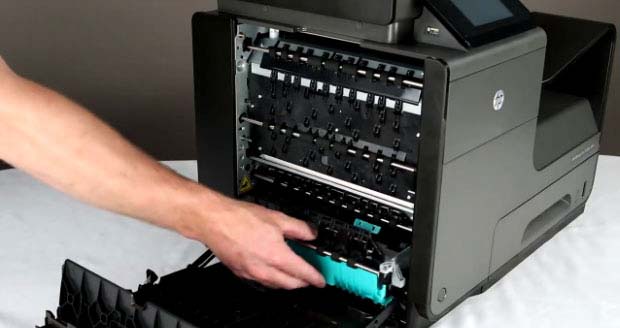 Install the new duplex module into your HP OfficeJet printer.