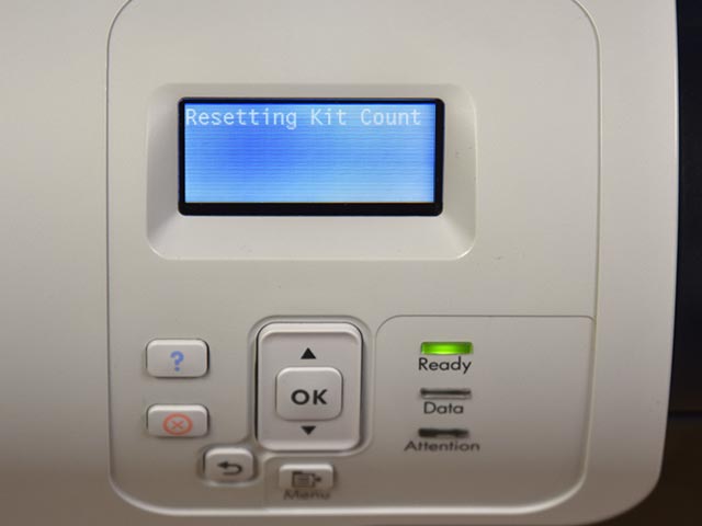 Step 6: The display on your HP CP3525 should verify that the fuser life counter has been reset with the words “RESETTING KIT COUNT”.